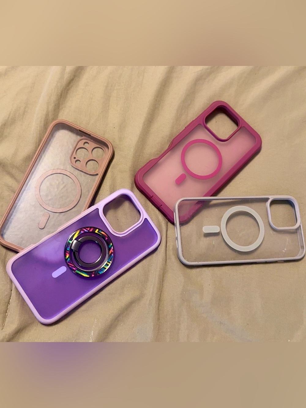 Set of 4 iPhone 16 Pro Max phone cases.